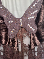 Metamorphosis top ￼